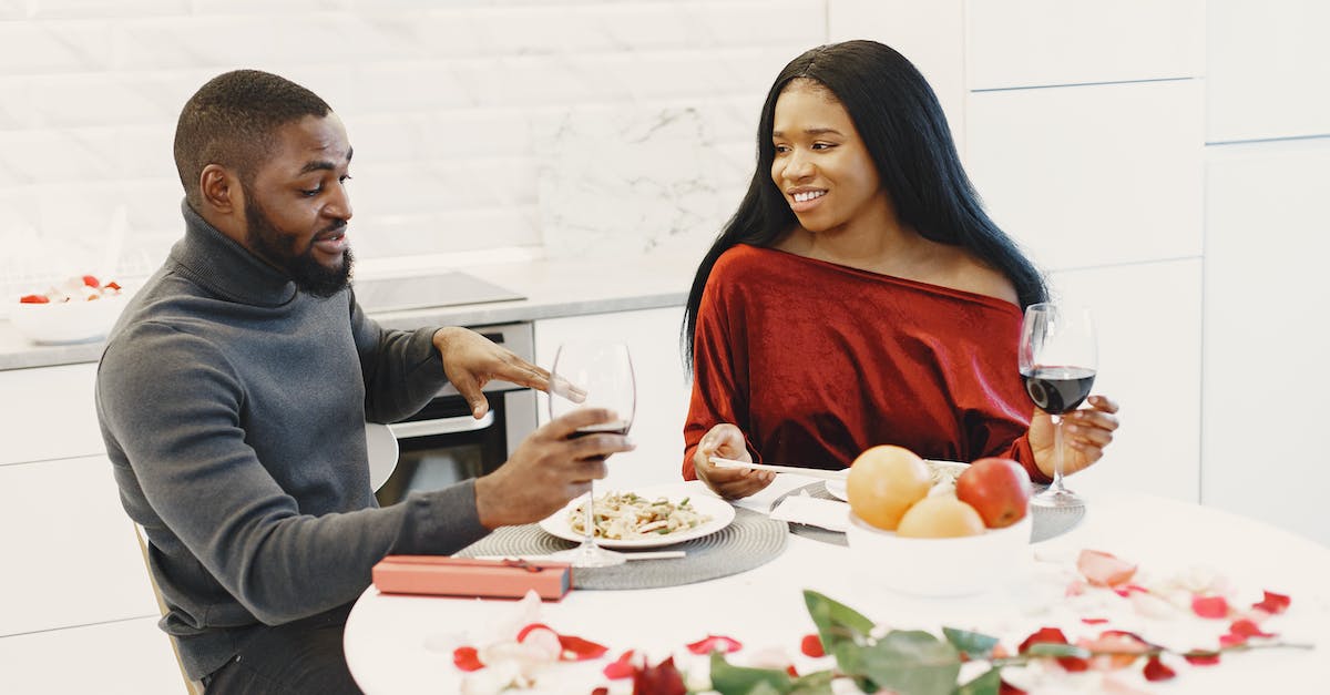 Will my citizens stop loving the king if I only give them wine for a day? - Couple Talking during Romantic Dinner
