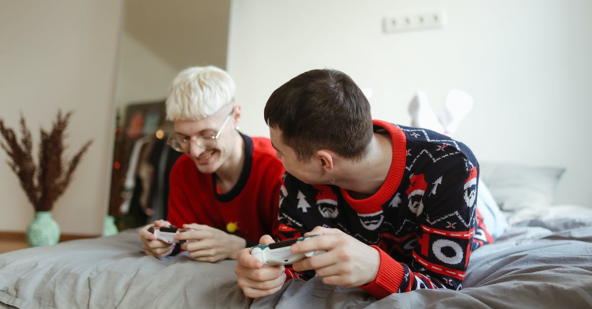 Will steam workshop download mods while playing a game? - A Couple Playing Video Game in the Room
