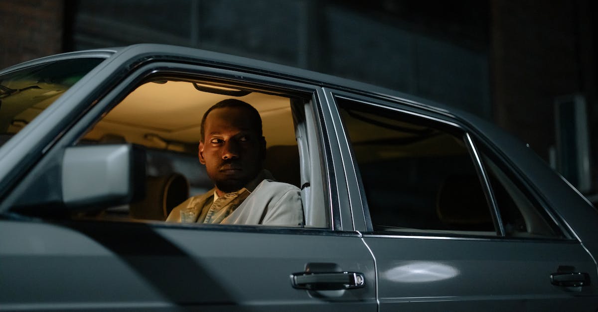 Windows 10 Video Driver Out-dated - Man Sitting Inside a Car Looking Vigilant