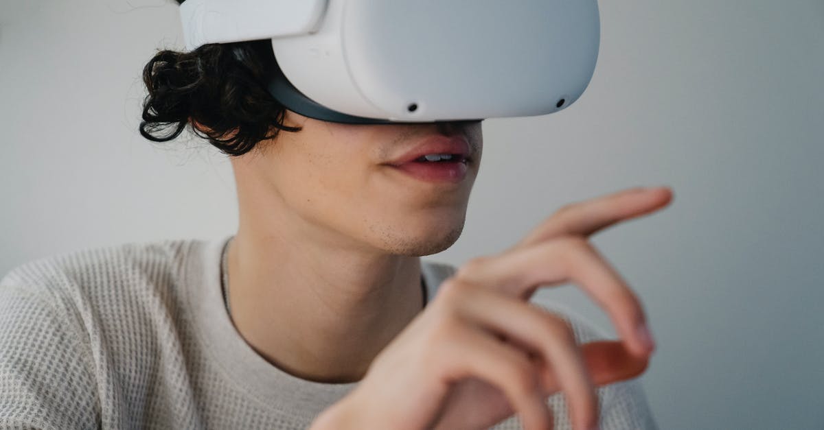 Witcher 3 experience when everything is grayed out - Young Hispanic guy interacting with virtual reality