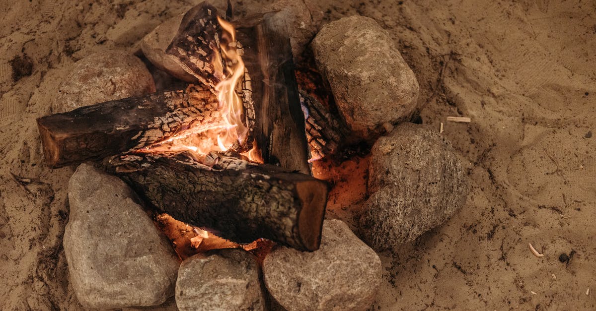 World of Warcraft Campfire Hack - A Burning Woods Near the Rocks on the Sand