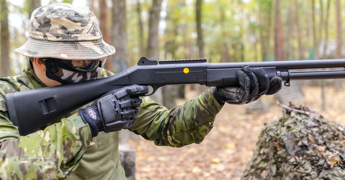 Worldguard problem in guard action - Person Holding Black Pump Shotgun