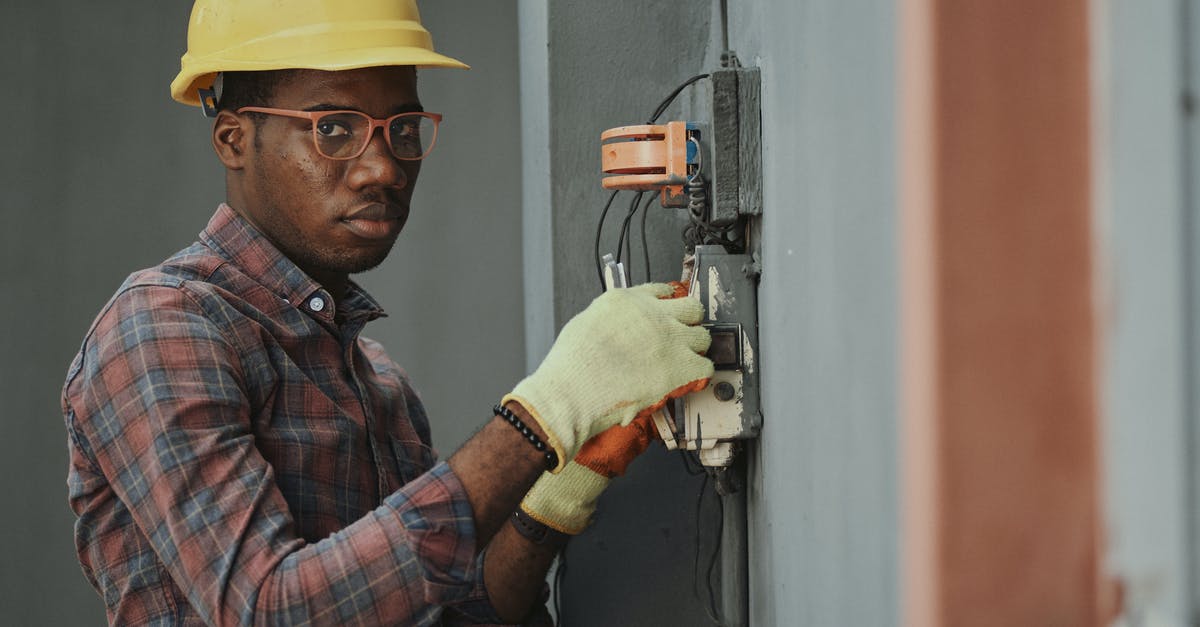 Would installing RPM cause any problems? - An Electrician Repairing a Fuse Box Would installing RPM cause any problems? - An Electrician Repairing a Fuse Box
