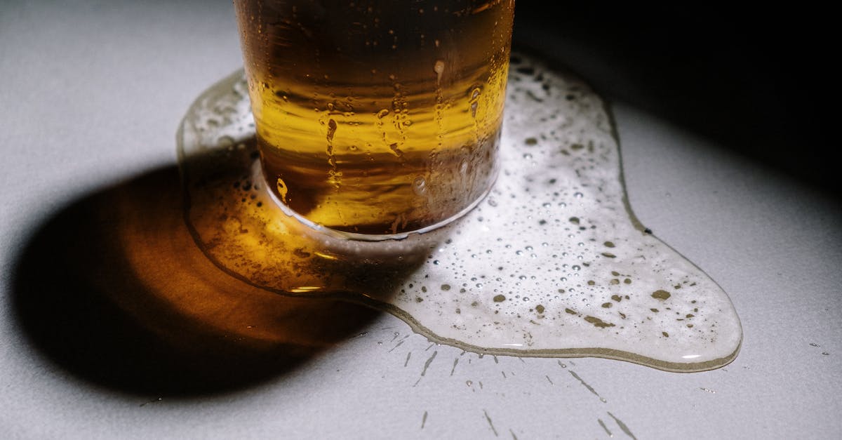 Would it overflow? - A Clear Drinking Glass With Brown Liquid Would it overflow? - A Clear Drinking Glass With Brown Liquid