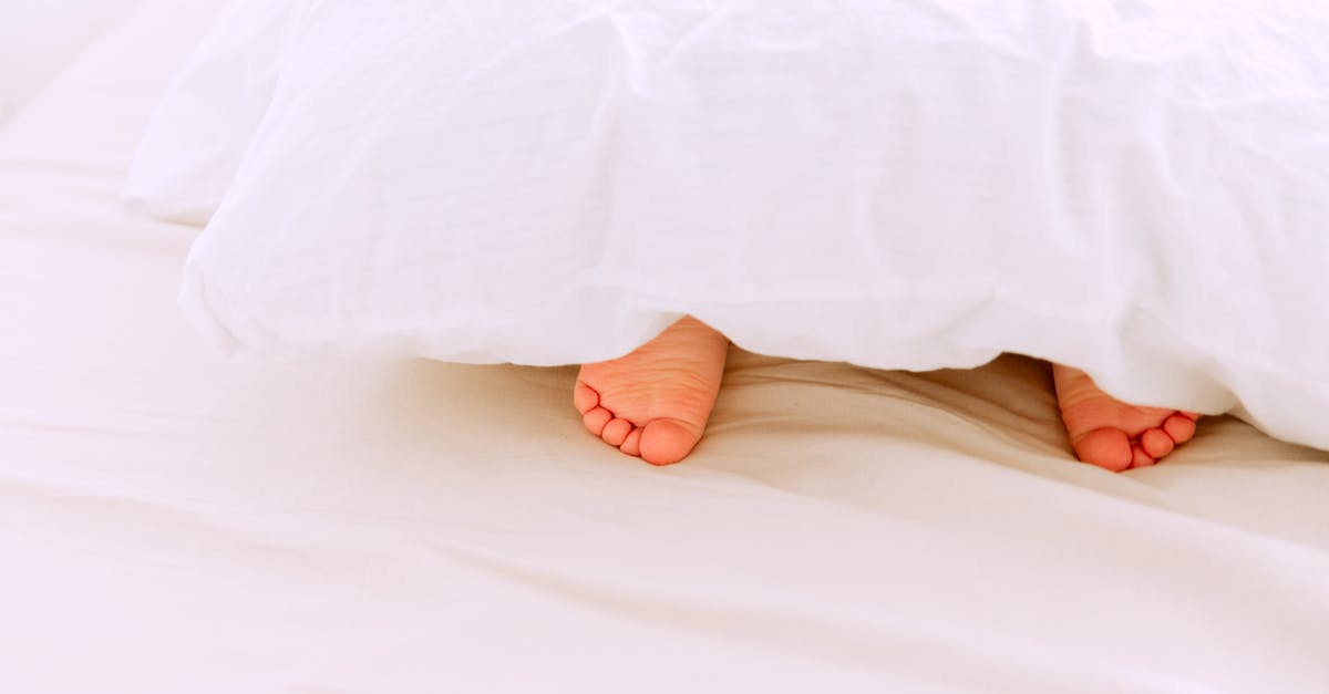 Would removing blocks under my terraria house make my house valid for npcs? - Crop tiny feet of little child lying under white blanket on comfortable bed in light bedroom at home Would removing blocks under my terraria house make my house valid for npcs? - Crop tiny feet of little child lying under white blanket on comfortable bed in light bedroom at home