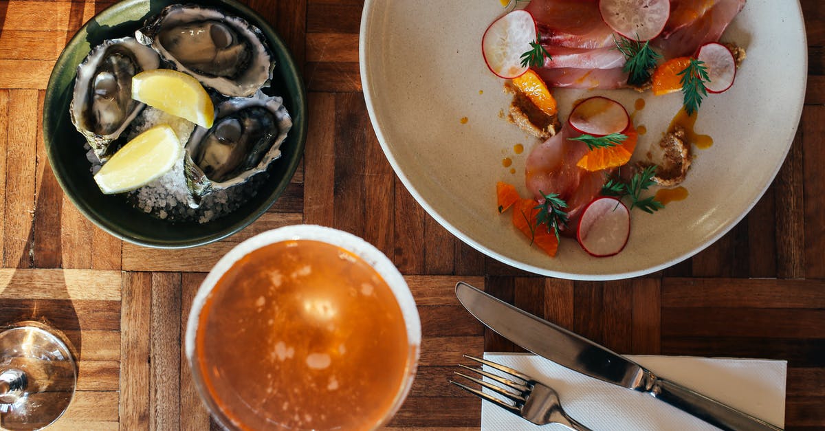 WoW upgrading from starter edition - Bowl of soup served on table with assorted seafood in restaurant WoW upgrading from starter edition - Bowl of soup served on table with assorted seafood in restaurant