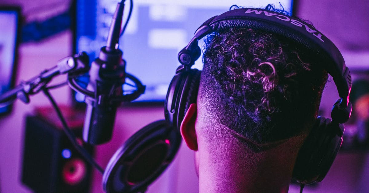 Xbox 360 game sound through headset - Photo of Person Wearing Headphones Xbox 360 game sound through headset - Photo of Person Wearing Headphones