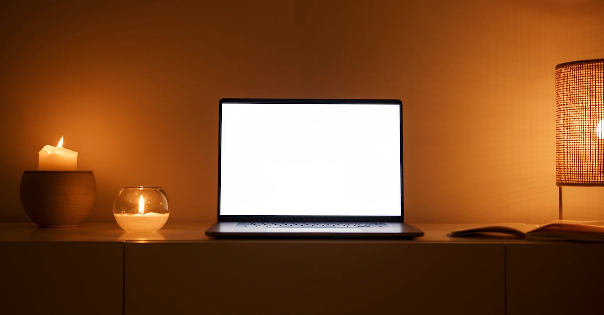 Xbox 360 green light turns on but it does not work or boot up - White Ipad on White Table