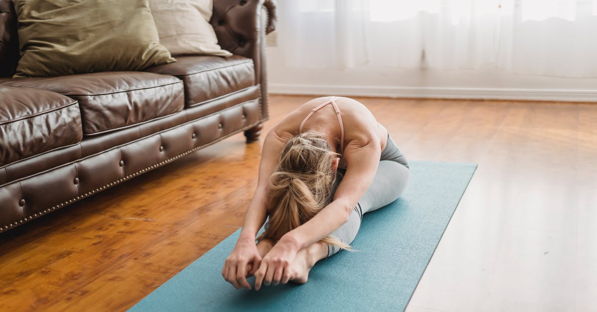 Xbox live gamertag recovery - Anonymous female yogi doing Pascimottanasana stretching exercise on mat at home Xbox live gamertag recovery - Anonymous female yogi doing Pascimottanasana stretching exercise on mat at home