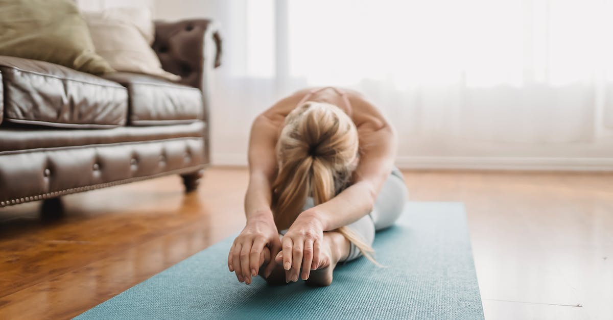 Xbox live gamertag recovery - Flexible lady practicing Pascimottanasana yoga pose at home Xbox live gamertag recovery - Flexible lady practicing Pascimottanasana yoga pose at home