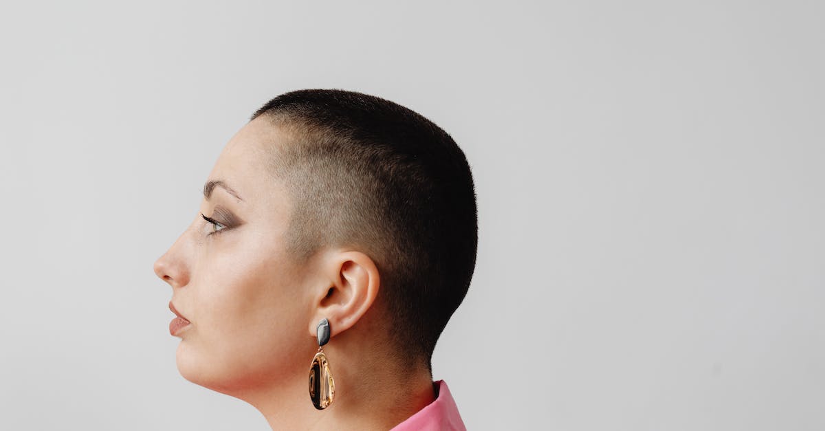Xbox One + Skype = Echo on other side - Profile Portrait of a Woman with Shaved Head Xbox One + Skype = Echo on other side - Profile Portrait of a Woman with Shaved Head