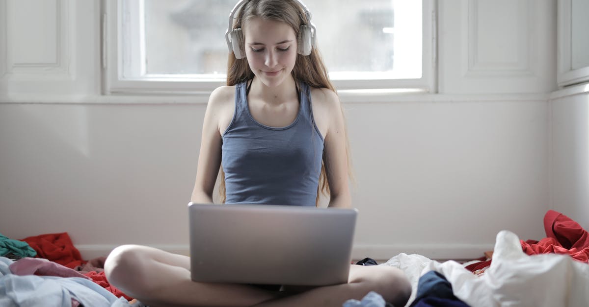 Xbox One to Windows 10 streaming quality - Woman in Blue Tank Top Using Macbook