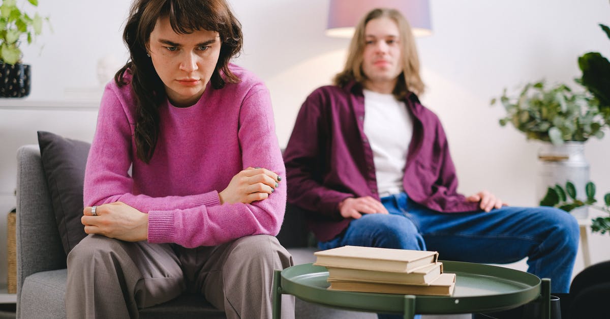 Xbox one update problem - Woman in Pink Sweater Sitting Beside Woman in Gray Sweater