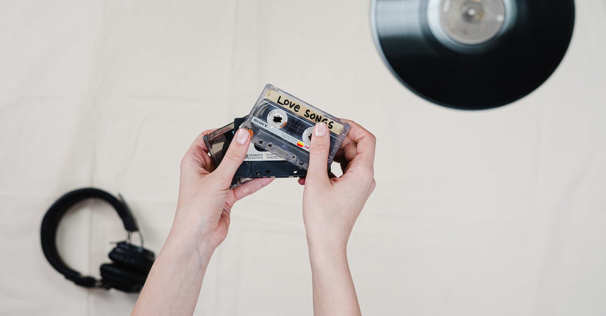 Xbox one X - surround with stereo headphones is possible - Person Holding A Love Song Cassette Tape