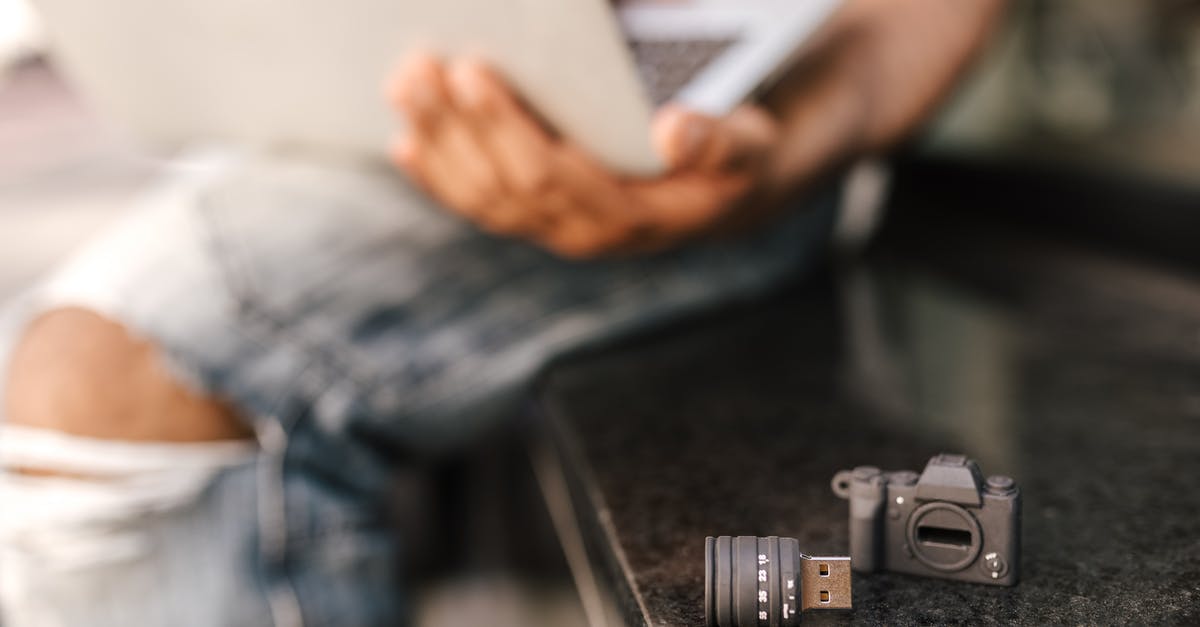 Xploder Xbox360 Minecraft Special Edition not recognising USB memory device - Selective focus of USB stick in shape of camera placed on seat next to crop faceless male freelancer browsing netbook while working remotely Xploder Xbox360 Minecraft Special Edition not recognising USB memory device - Selective focus of USB stick in shape of camera placed on seat next to crop faceless male freelancer browsing netbook while working remotely