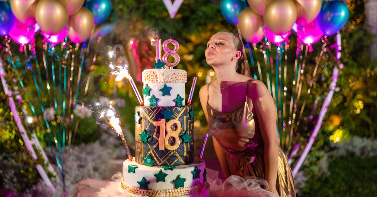 Yennefer the last wish explanation? - Birthday woman blowing candles on cake during celebration