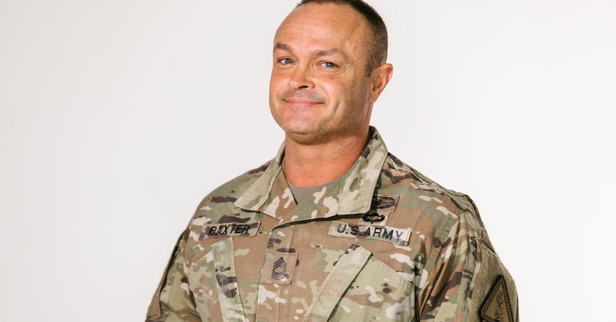Yesterday, I earned the 11 years of service badge and didnt level up - Portrait Photo of Smiling Soldier